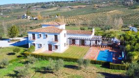 Classical Andalucian inspired country villa situated within the much sort after area of Llano del Cruz just 5 minutes drive outside the vibrant and historic town of Ronda , Southern Spain.
