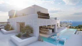 Espectacular villa de lujo de estilo ibicenco con vistas panorámicas al mar en Moraira