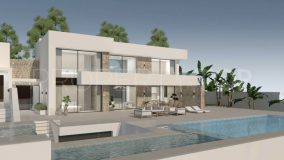 Luxury semi-detached villa with a private pool, terrace and garden in privilege location of Moraira