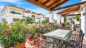 Exclusive three bedroom elevated ground floor apartment in the pretigious gated community, Monte Paraíso, on Marbella’s Golden Mile