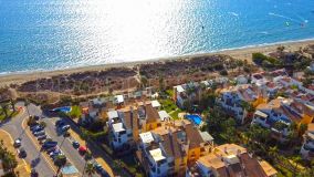 Fantastic five-bedroom beach front, semi-detached villa in Bahia de Marbella