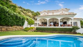 Unique four bedroom villa in the gated community of Montemayor residing on a large plot surrounded by nature