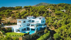 Stunning twelve bedroom villa with amazing views on a hilltop in the Alcuzcuz natural reserve, Benahavis