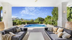 Immaculate four bedroom, south facing villa in La Quinta, Benahavis, with stunning sea views