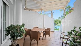 Spacious three bedroom, southwest facing ground floor apartment in the well-known and gated community Marbella Real