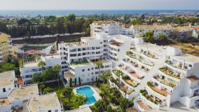 Incredible investment opportunity to purchase a two bedroom apartment in the gated community of Jardines de Andalucía with sea views