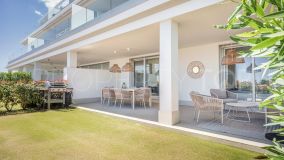 Welcome to this modern and newly built ground floor apartment on the New Golden Mile in Estepona!