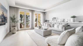 Welcome to this spacious and bright 3 bed, 3 bath ground floor corner apartment is located in the heart of one of the most desired areas in Marbella, Nueva Andalucía!