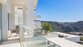 Exquisitely presented 3 bedroom penthouse with panoramic sea and mountain views.