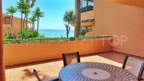 Spectacular townhouse with sea views in front line residential in Estepona.
