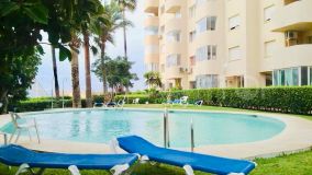 Front line beach flat in the heart of Estepona Marina.