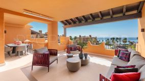 Elegant frontline beach apartment in a luxury complex near Estepona town. Completely refurbished in 2024 to a very high stanard!