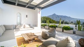 Stunning 4-bedroom townhouse with breathtaking mountain and sea views in Nueva Andalucia