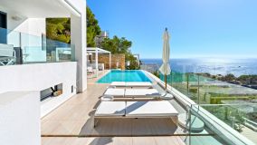 Exquisita villa de lujo de 4 dormitorios con vistas panorámicas al mar en Roca Llisa, Ibiza: Un santuario de opulencia y tranquilidad