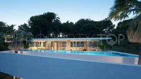 Exquisita villa de nueva construcción de 4 dormitorios en una urbanización cerrada con seguridad en Can Furnet - Santa Eulalia