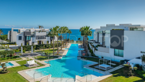 Modern luxury 4 bedroom beach front townhouse with sea and mountain views in The Island - Estepona