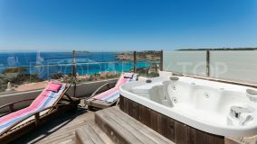 Exclusive, renovated 3 bedroom townhouse with stunning sea views and roof terrace in the heart of the bay of Cala Tarida - Sant Josep