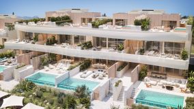 Exclusiva promoción de obra nueva en primera línea de playa de casas de 3 dormitorios con vistas al mar en Marbella Este