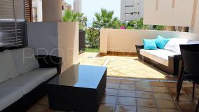 Exclusive ground-floor apartment in a beachfront complex in Estepona