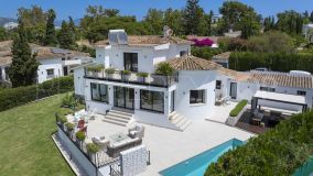 Brand new luxurious and exclusive modern villa, 4 bedrooms, 5 bathrooms, located front line golf in the highly sought after area of Guadalmina Alta.