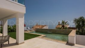 Contemporary style, fully furbished and refurbished 3 / 4 bedroom villa located on the beach at Arena Beach, Estepona
