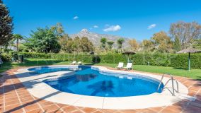 Large corner unit located in a famous and secure community Lomas de Marbella Club, in the heart of the Golden Mile.