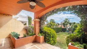Townhouse with large basement in the prestigious Alzambra complex, very close to Puerto Banus.