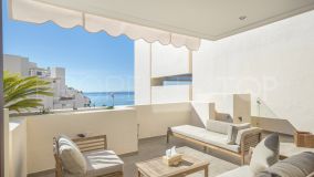 A frontline beach penthouse for sale in Estepona, with private pool