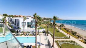Gorgeous 3 bedroom beachfront townhouse in Estepona, with panoramic sea views.