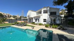 A stylish fully renovated 5 bedroom villa with partial sea views in Elviria, Marbella East