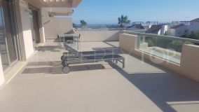 2 bedrooms apartment. Large terrace with golf and sea views in Benahavis