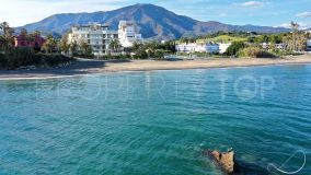 Luxurious first line beach Off-plan groundfloor apartment located in Estepona