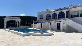 Three bed villa with a seperate 2 bed apartment. Sea views and close to amenites