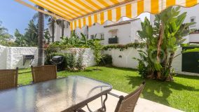 Ground floor apartment with large sunny private garden for sale.