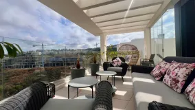 Buy duplex penthouse in La Cala Golf Resort with 3 bedrooms