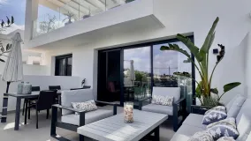 Buy duplex penthouse in La Cala Golf Resort with 3 bedrooms