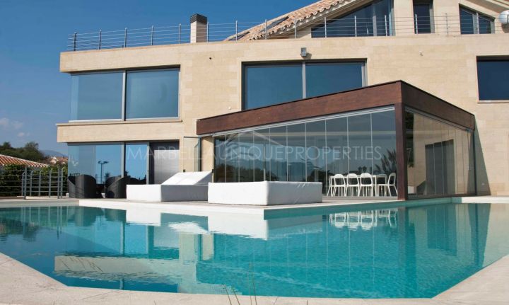 A stunning frontline beach contemporary style villa, Marbella East