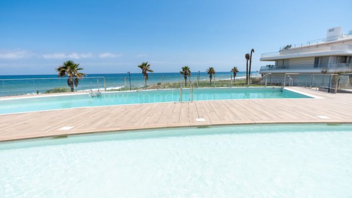 Estepona, The Edge, Estepona, Luxury ground floor apartment with garden for sale Beachfront