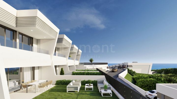Contemporary golf townhouses with sea views