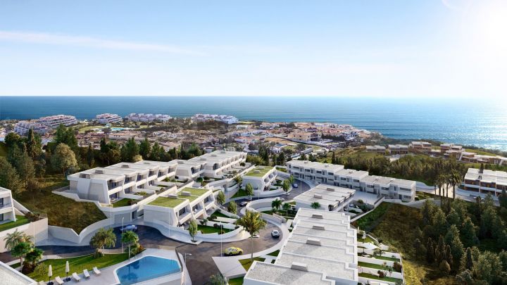 Contemporary golf townhouses with sea views