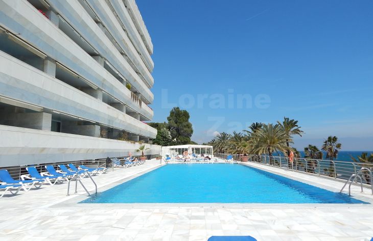 Exclusive 2-bedroom oceanfront apartment for sale in Marina Mariola, Marbella