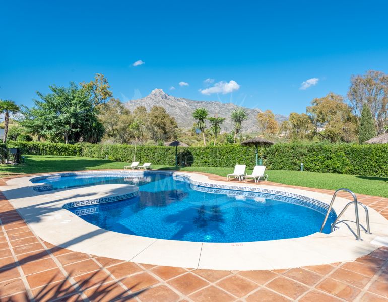 Large corner unit located in a famous and secure community Lomas de Marbella Club, in the heart of the Golden Mile.