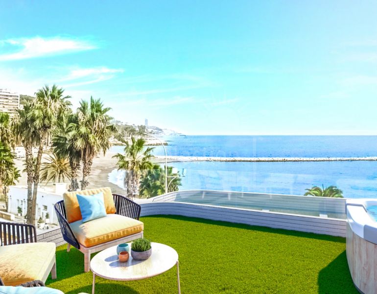 Exclusive frontline beach penthouse with sea views in Malaga.