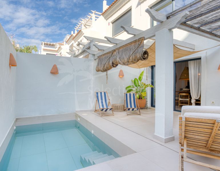 Elegant, three bedroom townhouse located in the gated community of Agra Residencial, Estepona