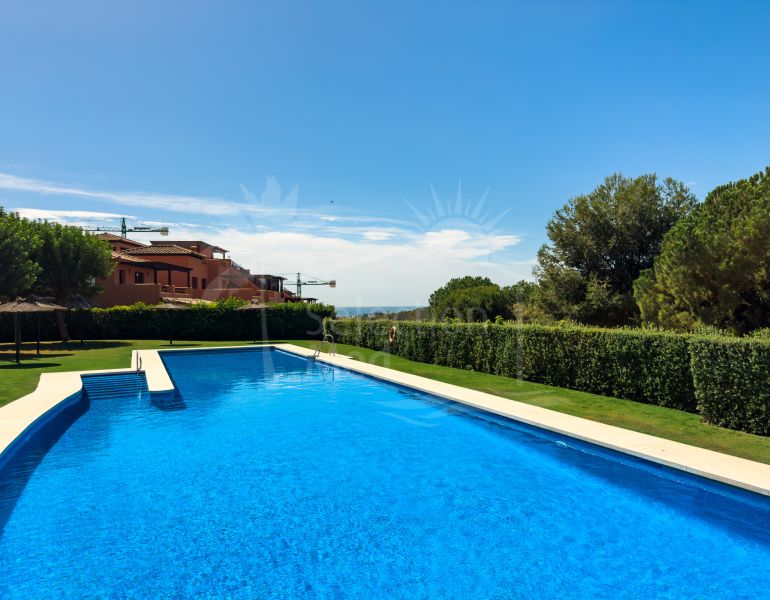 PENTHOUSE WITH LARGE TERRACE, SOLARIUM, AND OPEN VIEWS INCLUDING SIDE SEA VIEWS!