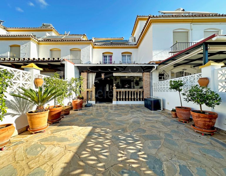 Charming Townhouse with Large Terrace and Private Garage in the Center of Estepona