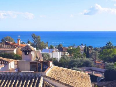 Casa adosada con vistas al mar y jardín privado