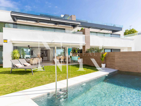 Maison jumelée dans le lotissement Artola Homes avec piscine privée à vendre