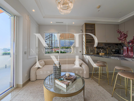 Completely refurbished penthouse on the Golden Mile next to the beach with sea views for rent.