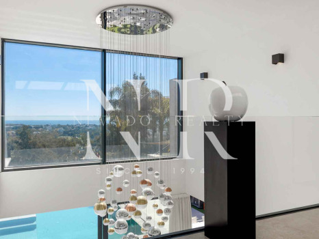 Villa en La Alquería con vistas panorámicas al mar y al golf en venta